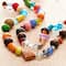 Assortiment de petites perles multicolores de Bead Landing